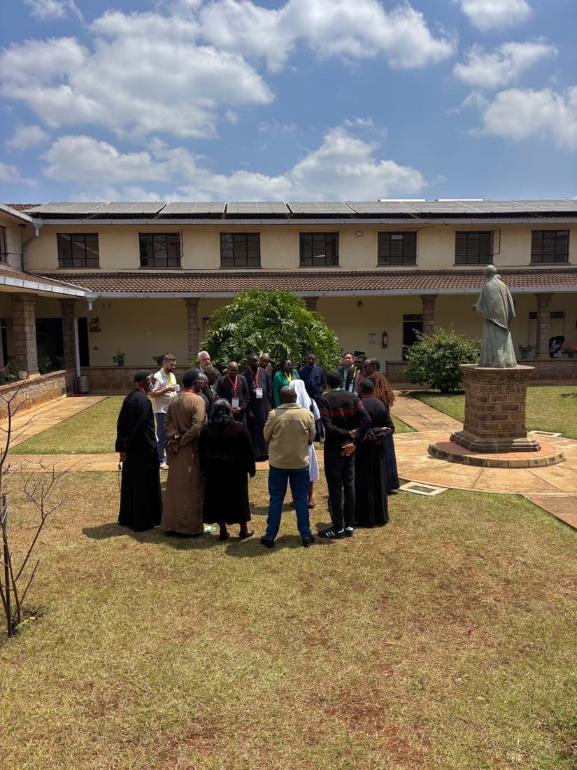 Participants gathered in the courtyard of the conference centre.