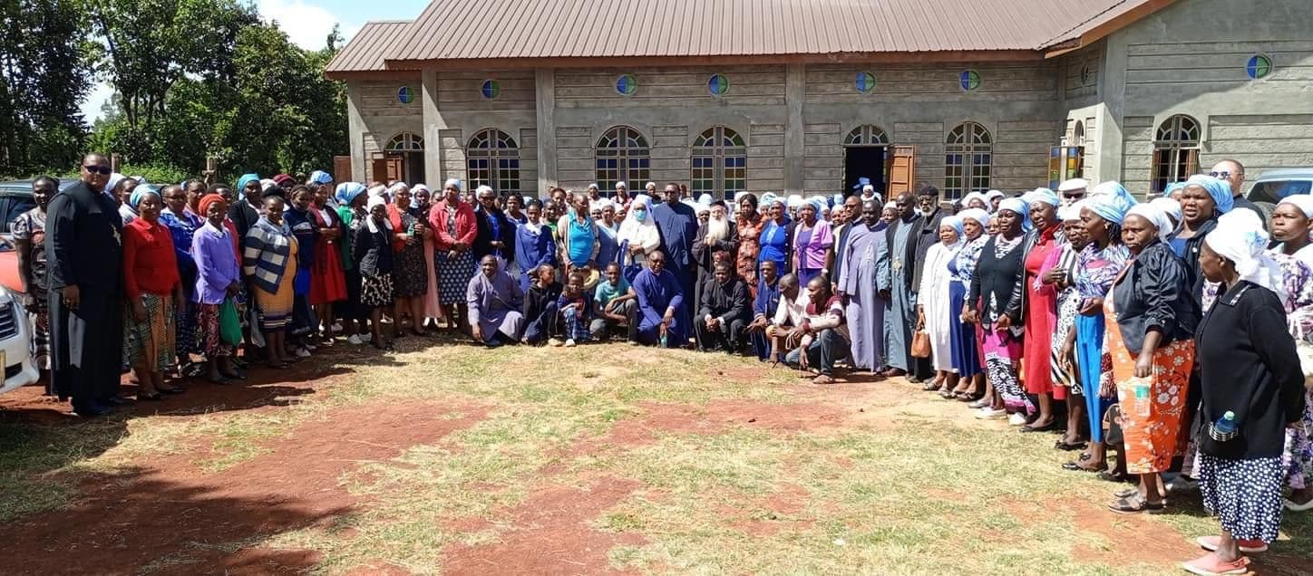 A large gathering outside a parish church at a workshop on the role of Orthodox women in the Church.